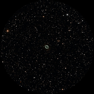 Telescopic half-degree field of view centered on M57.